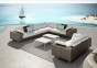 Paros Lounge Module von Dedon auf einer Terrasse am Meer