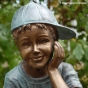 Bronzeskulptur Kopf vom Jungen mit Kappe 