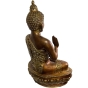 Seitenansicht der Bronzefigur "Sitzender Buddha"
