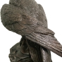 Bronzeskulptur "Mäusebussard auf Felsen"