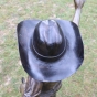 Bronzeskulptur "Junges Cowgirl mit Lasso"