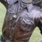 Bronzeskulptur "Junges Cowgirl mit Lasso"