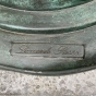 Bronzebrunnen "Putte auf Fisch" als Wasserspeier