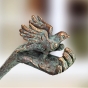 Edition Strassacker Bronzeskulptur "Mädchen mit Vogel" von Kurtfritz Handel