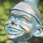 Fröhliches Gesicht eines Gnom aus Bronze