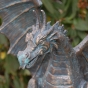 Bronzeskulptur "Drachenvogel Terrador - groß" auf Granitfindling