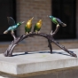 Bronzeskulptur "Vier Vögel auf einem Zweig"