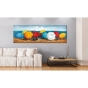 Wandbild bunter Strand im Wohnzimmer