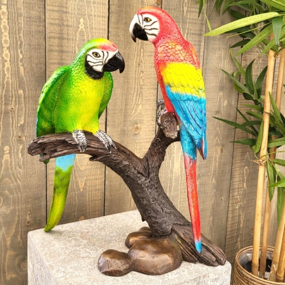 Bronzeskulptur "Zwei Papageien auf einem Ast"