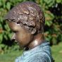 Bronzeskulptur Kopf von einem Jungen linke seite