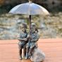 Regenschirmpärchen als Wasserspeier