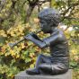 Bronzeskulptur Kleiner Junge Peter der Flötenspieler auf Säule 