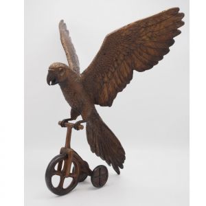 Bronzeskulptur "Papagei auf Dreirad"