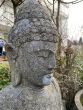 Kopf vom Buddha von der Seite aus Basanit 